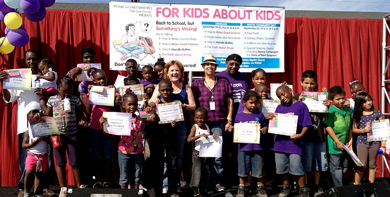 Nancy, Carol, Bishop Harris and the kids